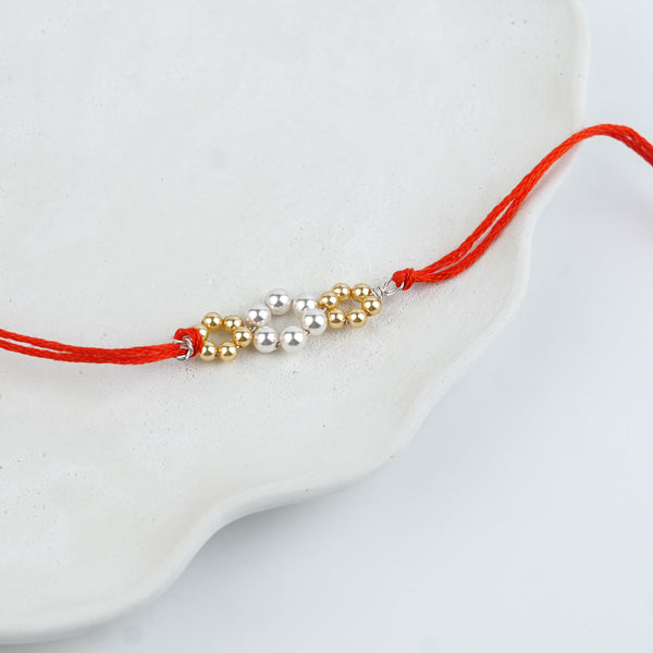 Golden & White Pearl Handmade Silver Rakhi