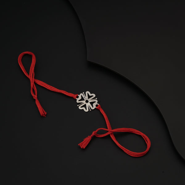 Silver Laser cut Flower Rakhi