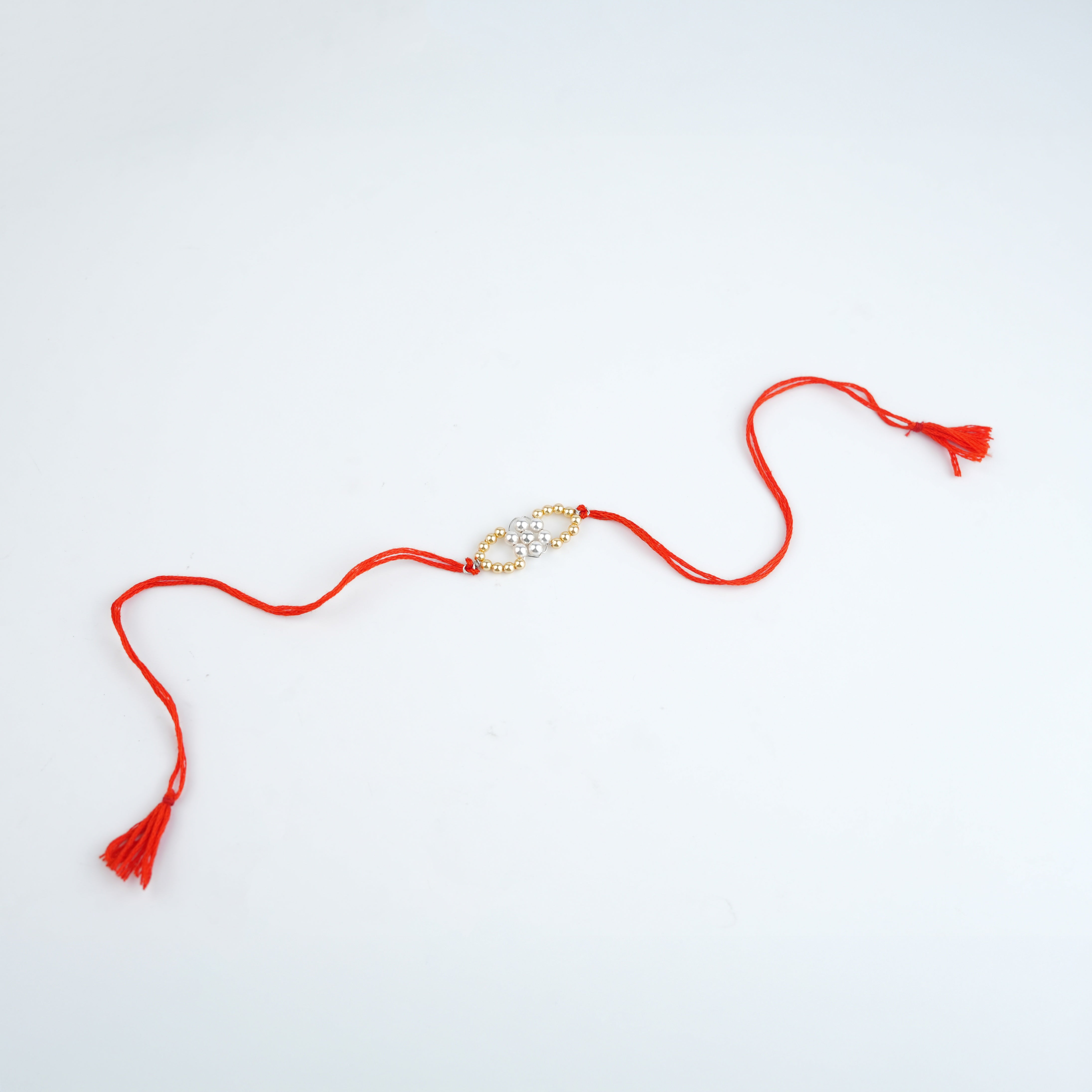 Golden & White Pearl Handmade Silver Rakhi