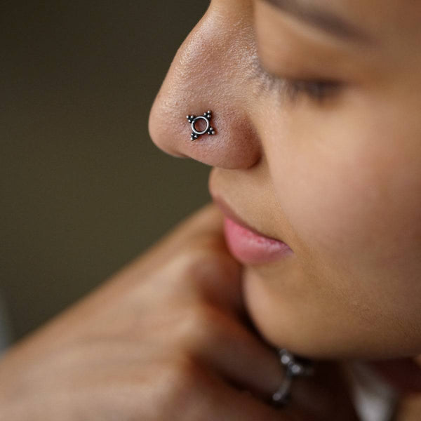 Minimal silver Nabha nose pin detailing