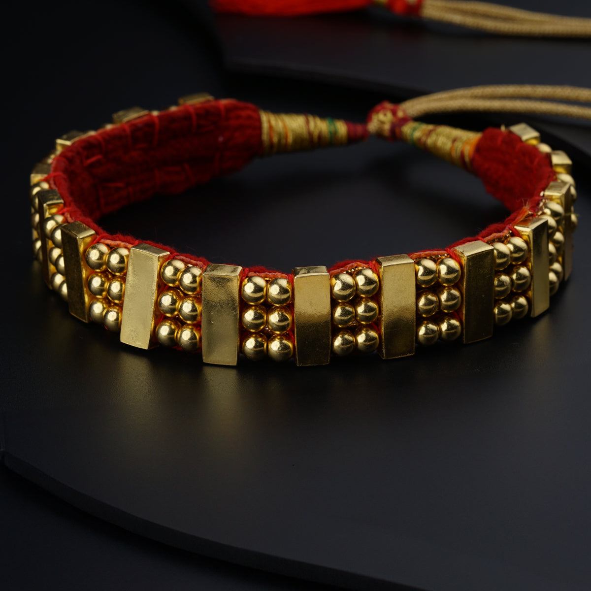 a close up of a bracelet on a table