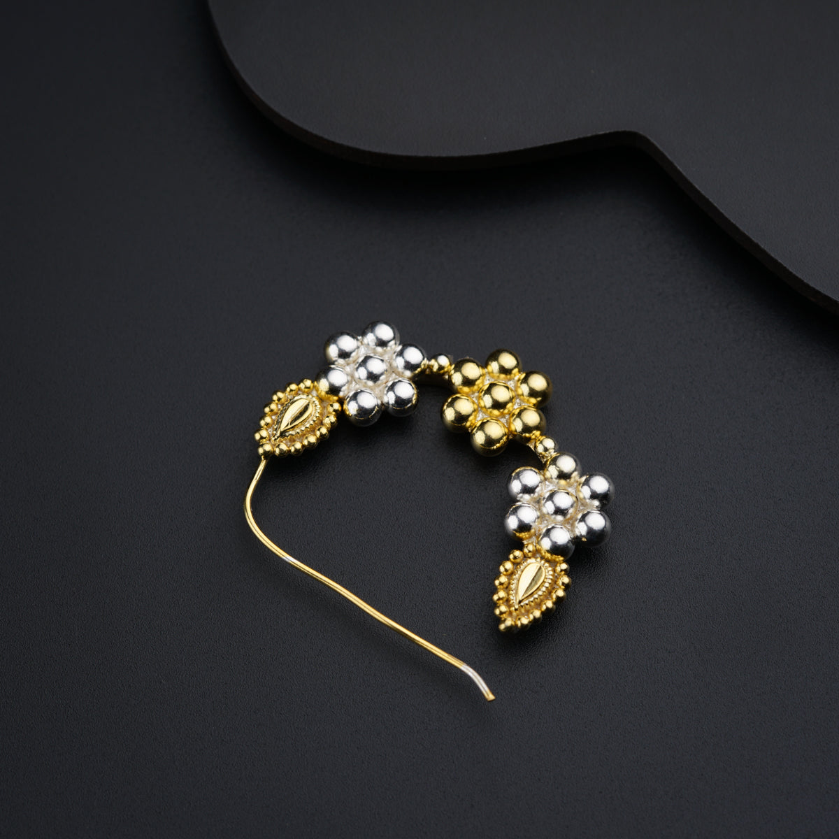 a pair of gold and white beaded hair pins