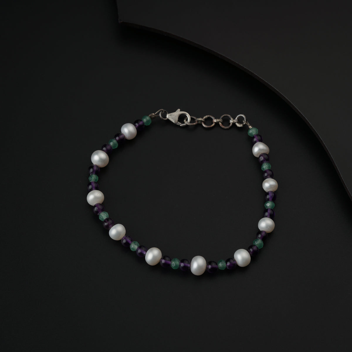 Semi precious stone bracelet in silver wire ( Amethyst , Onxy , Pearls )