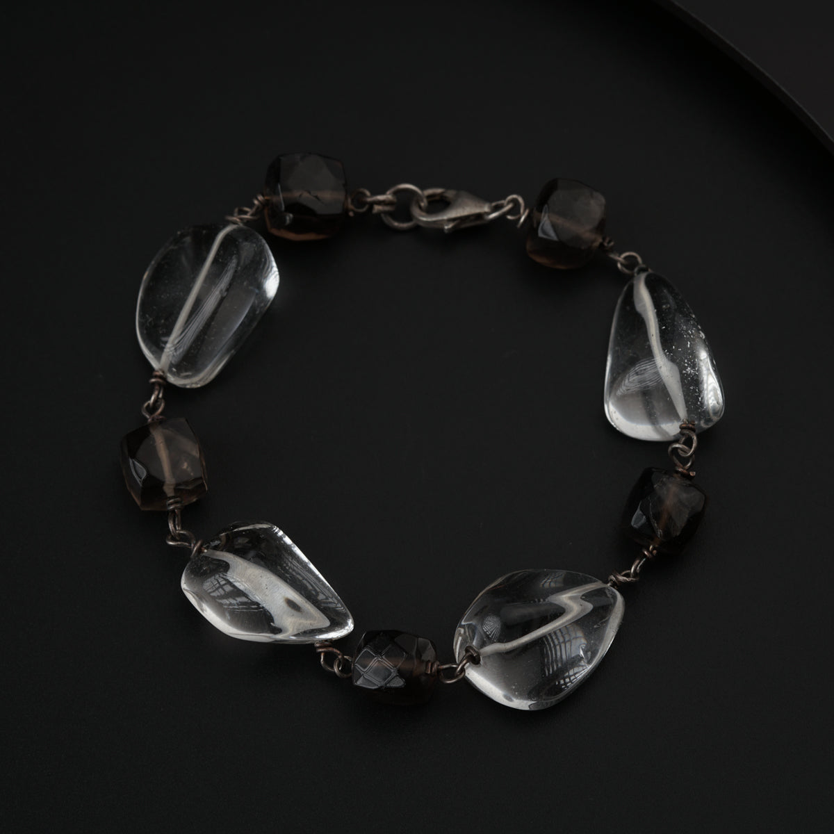 Semi precious stone bracelet in silver wire ( Crystal and Smokey Quartz )