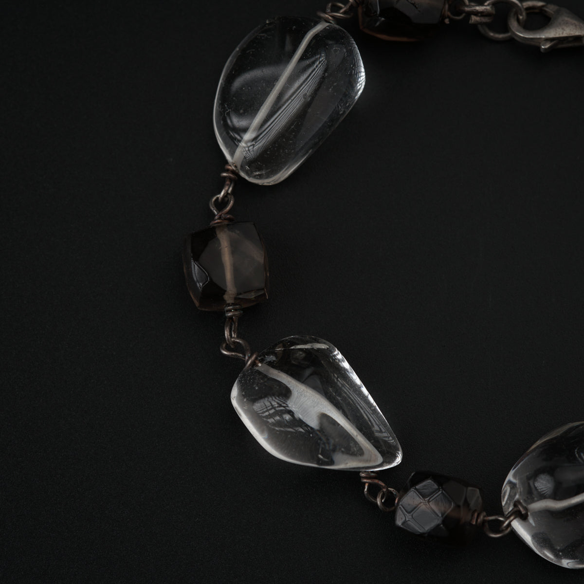 Semi precious stone bracelet in silver wire ( Crystal and Smokey Quartz )