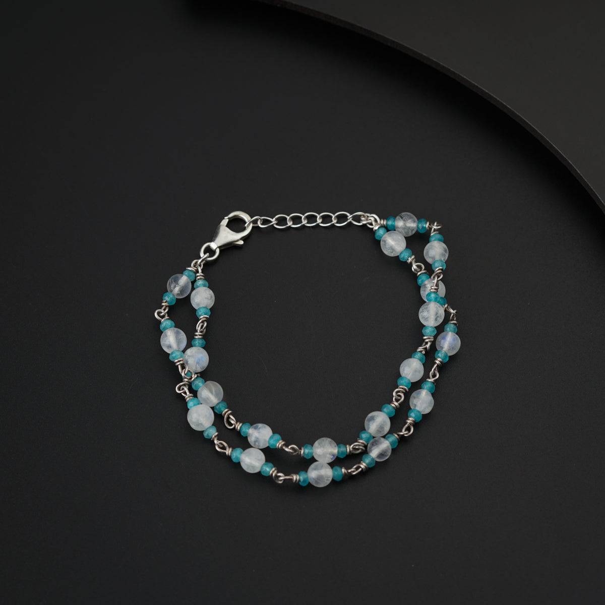 Semi precious stone bracelet in silver wire ( Moon stone and Jade )