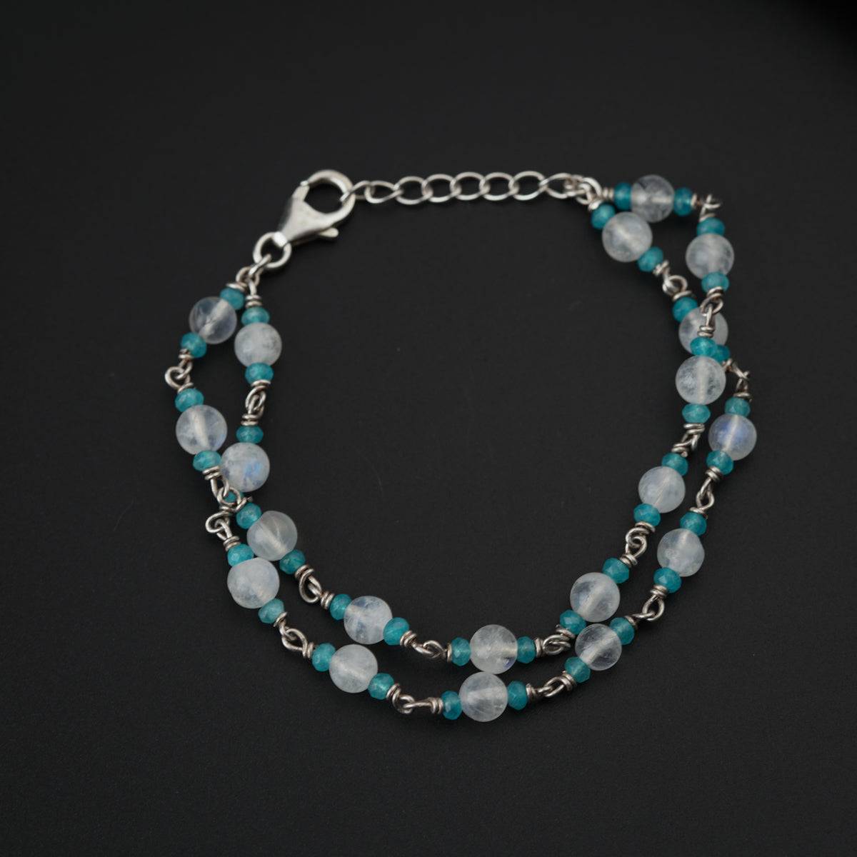 Semi precious stone bracelet in silver wire ( Moon stone and Jade )