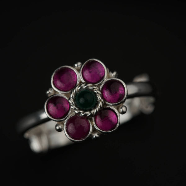 Silver floral ring with pink and green stones