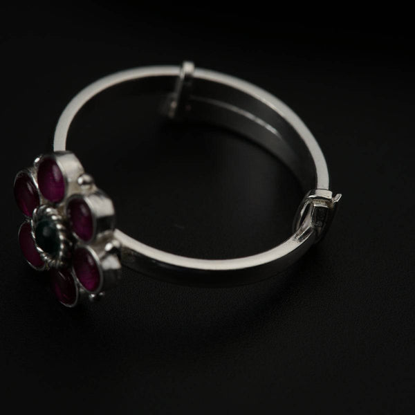 Silver floral ring with pink and black stones
