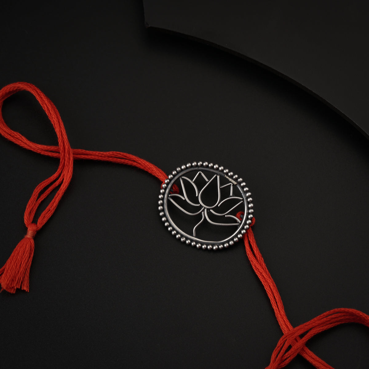 Handcrafted Silver Rakhi/Pendant: Lotus