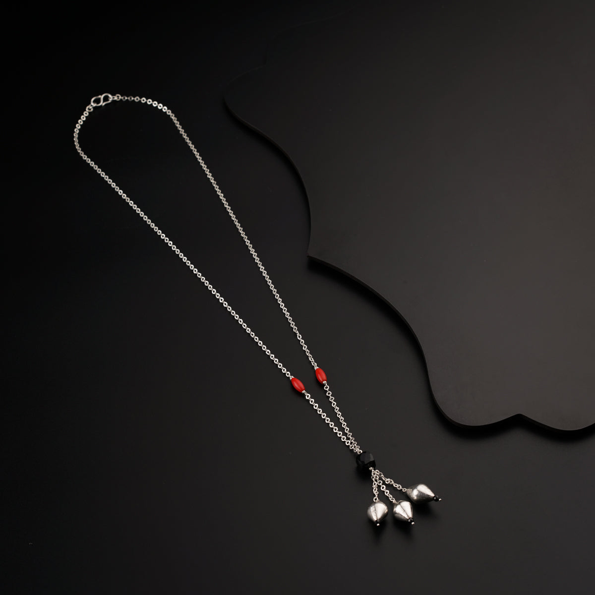 Silver necklace with dholaki beads and corals