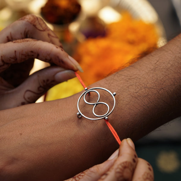 Silver Infinity Round Rakhi
