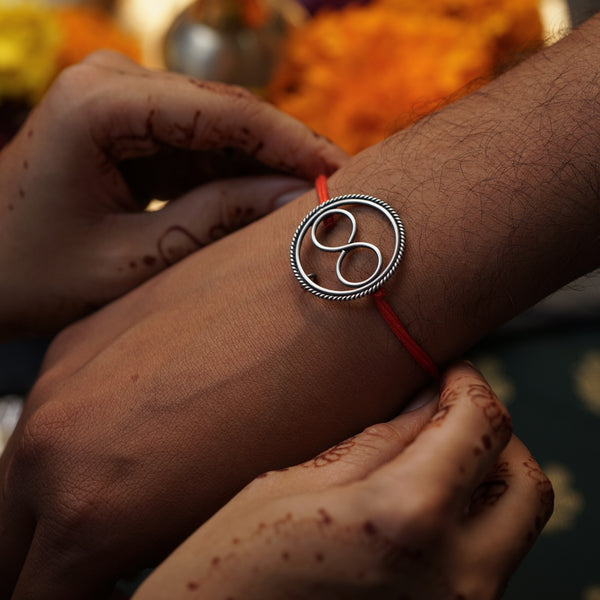 Handcrafted Silver Rakhi/Pendant: Infinity