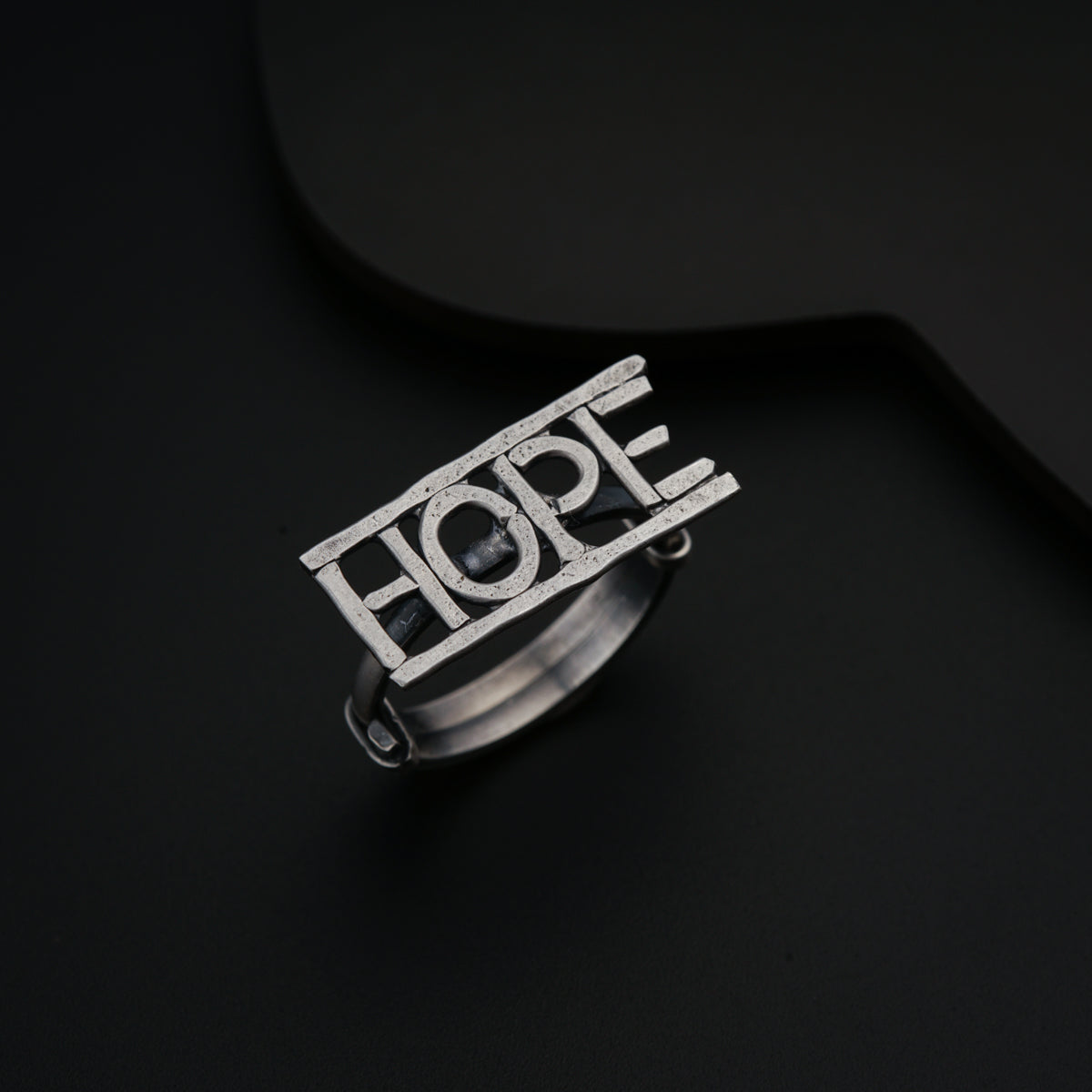 a ring with the word hope on it