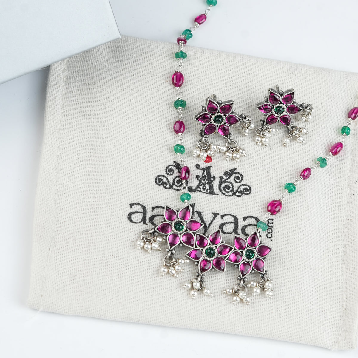 Silver Bageecha Flower Set with Rubies & Green Onyx