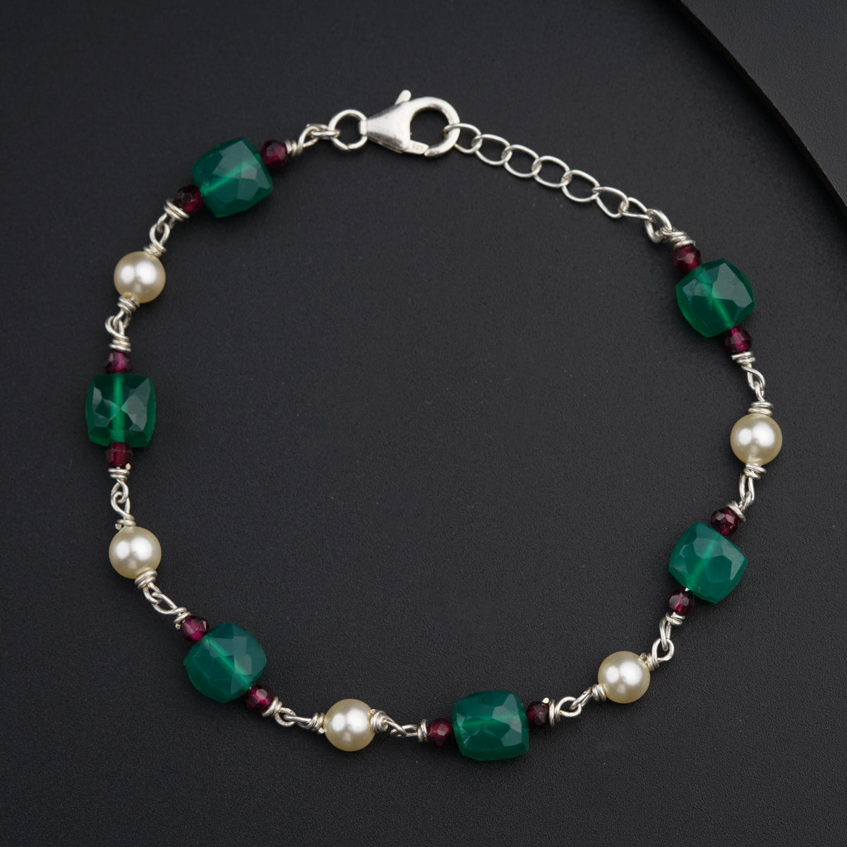 Lot - Sterling Silver bracelet with silver and semi precious stones in  Amber, Yellow, Dark Green and Clear Stones. Made in Italy Approx. L:19cm