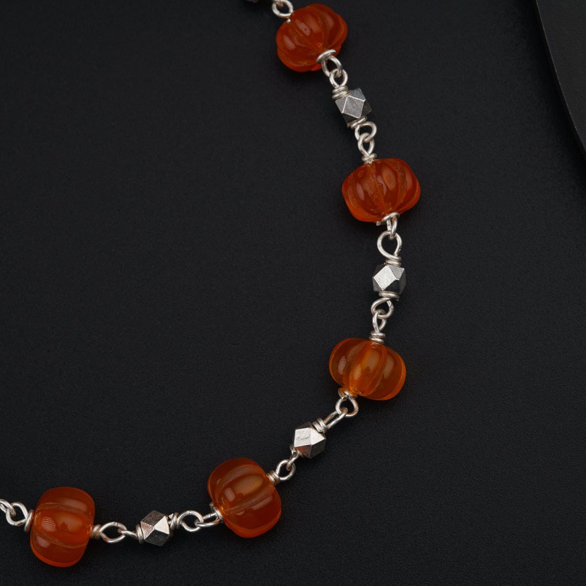 Silver set with carved Carnelian stones