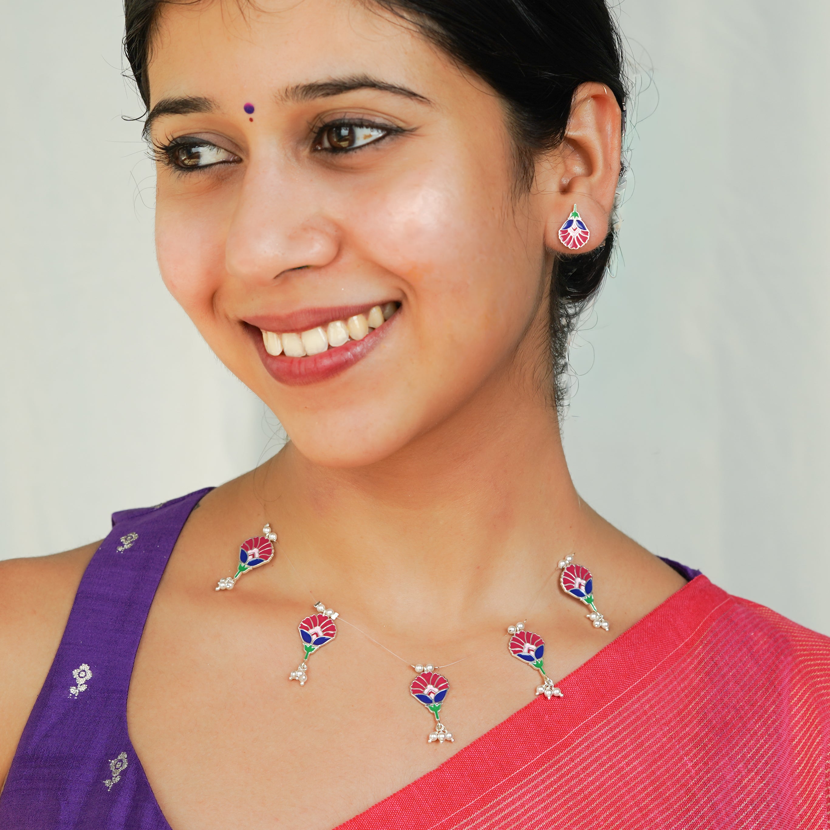 Meena charm set with invisible thread