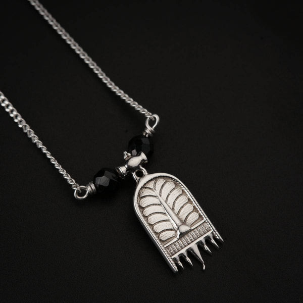 Silver chain with black beads and pendant