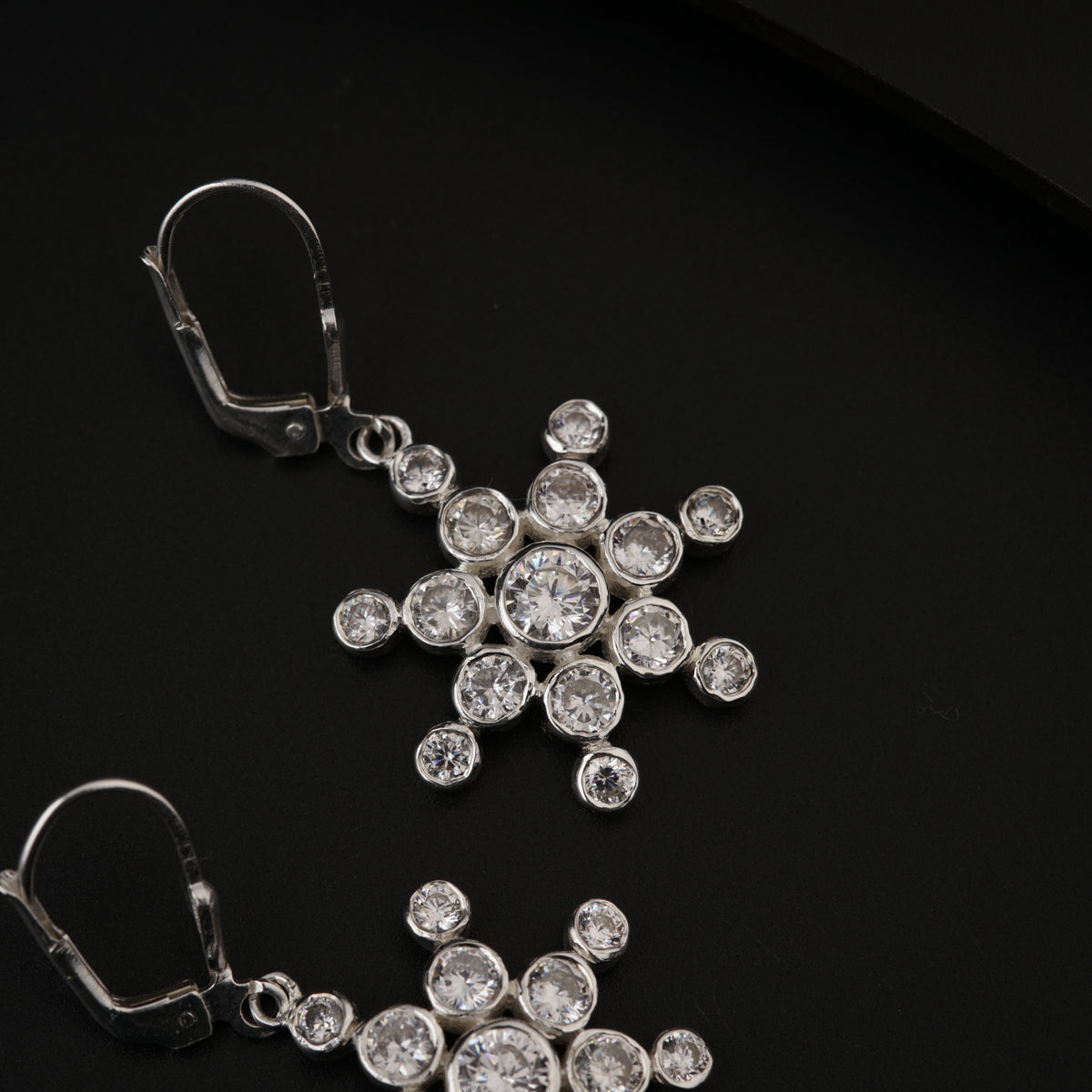 CZ Stone Studded Snowflake Silver Earring