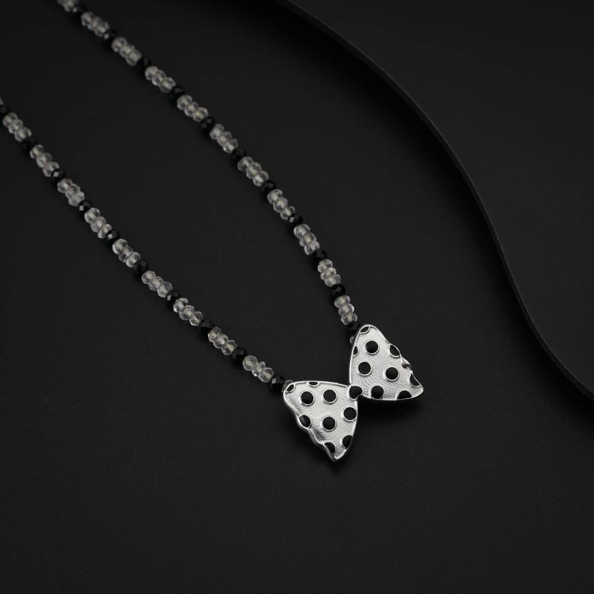 Polka Dots Bow Necklace with Crystals and Black Spinels