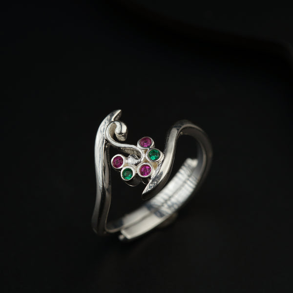 a close up of a ring on a black surface