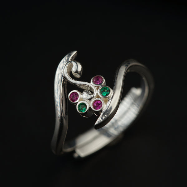 a close up of a ring on a black background