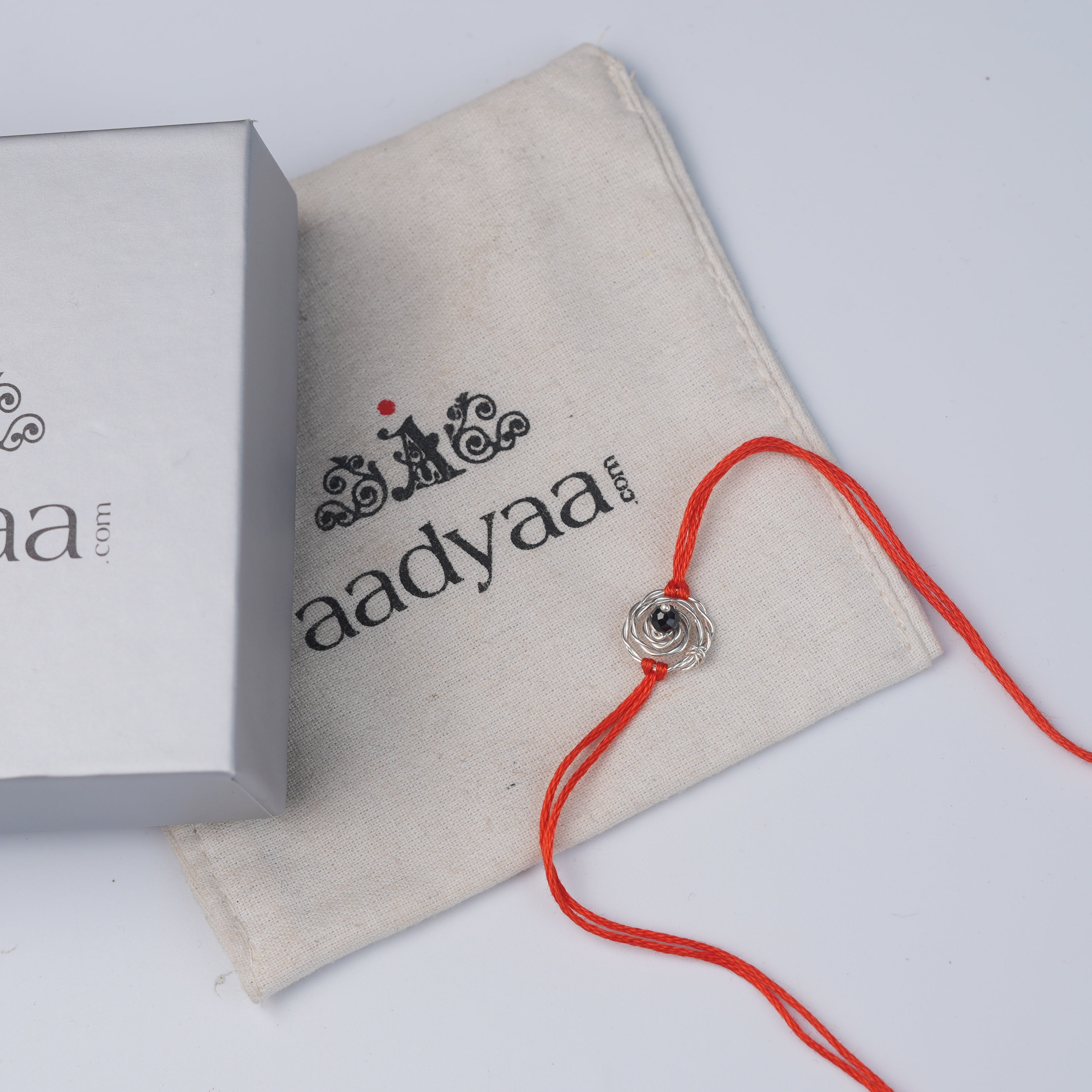 Black Spinel & Rose Rakhi (Project Handmade)