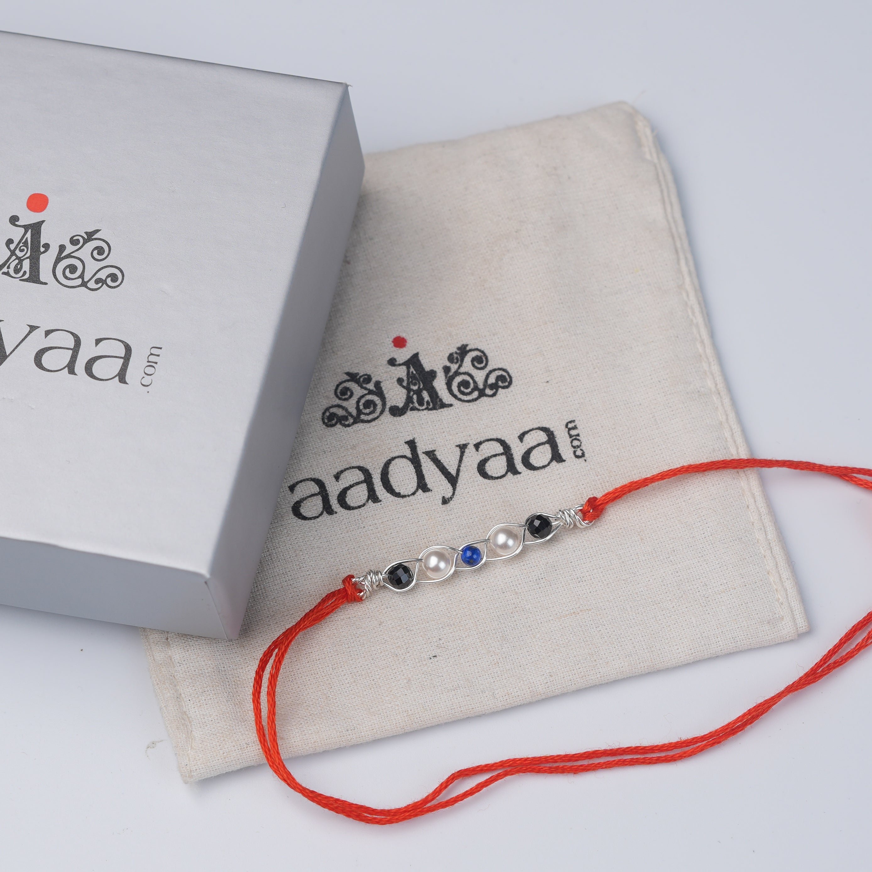 Evil Eye Wrapped Rakhi (Project Handmade)