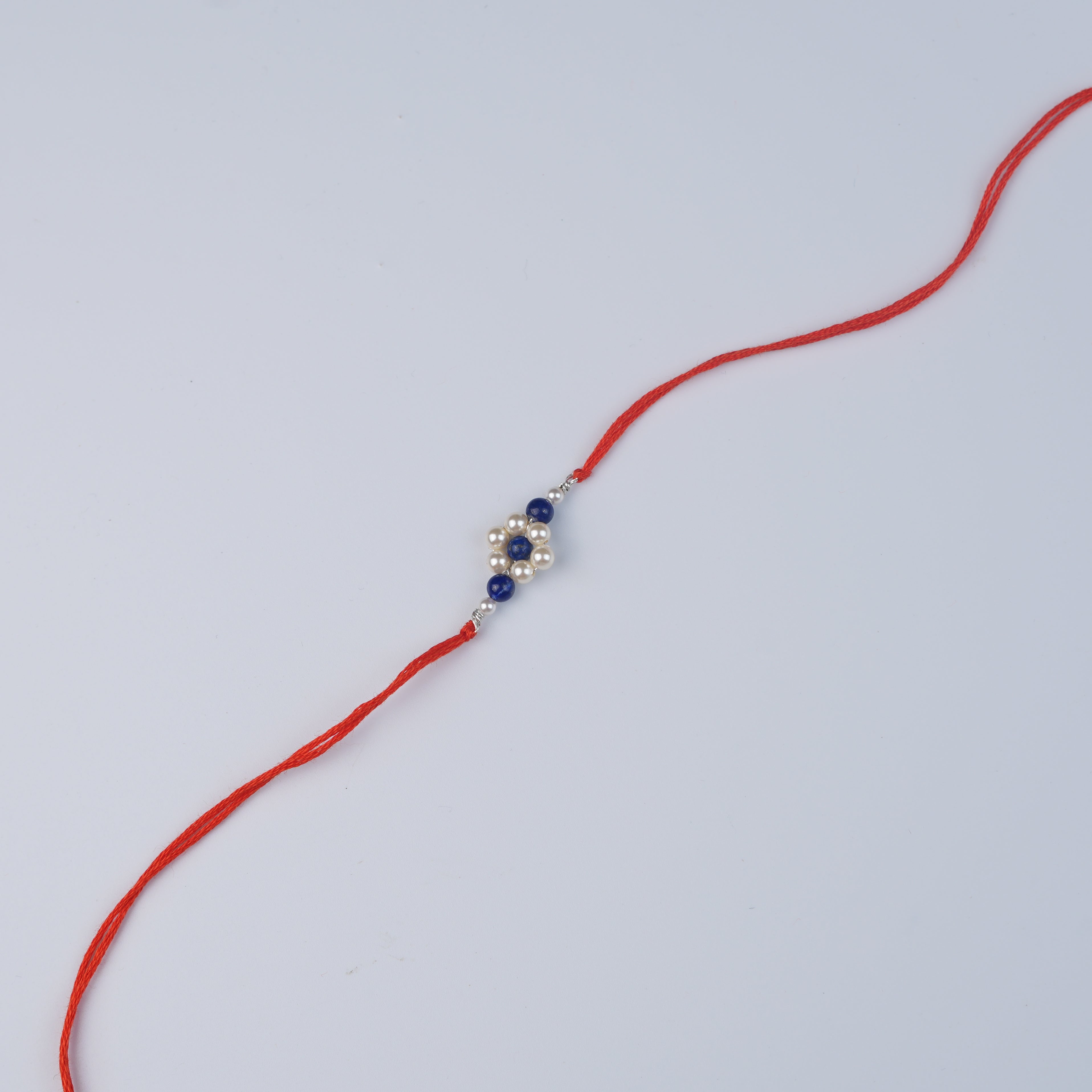 Lapis Lazuli & Pearl Flower Rakhi (Project Handmade)