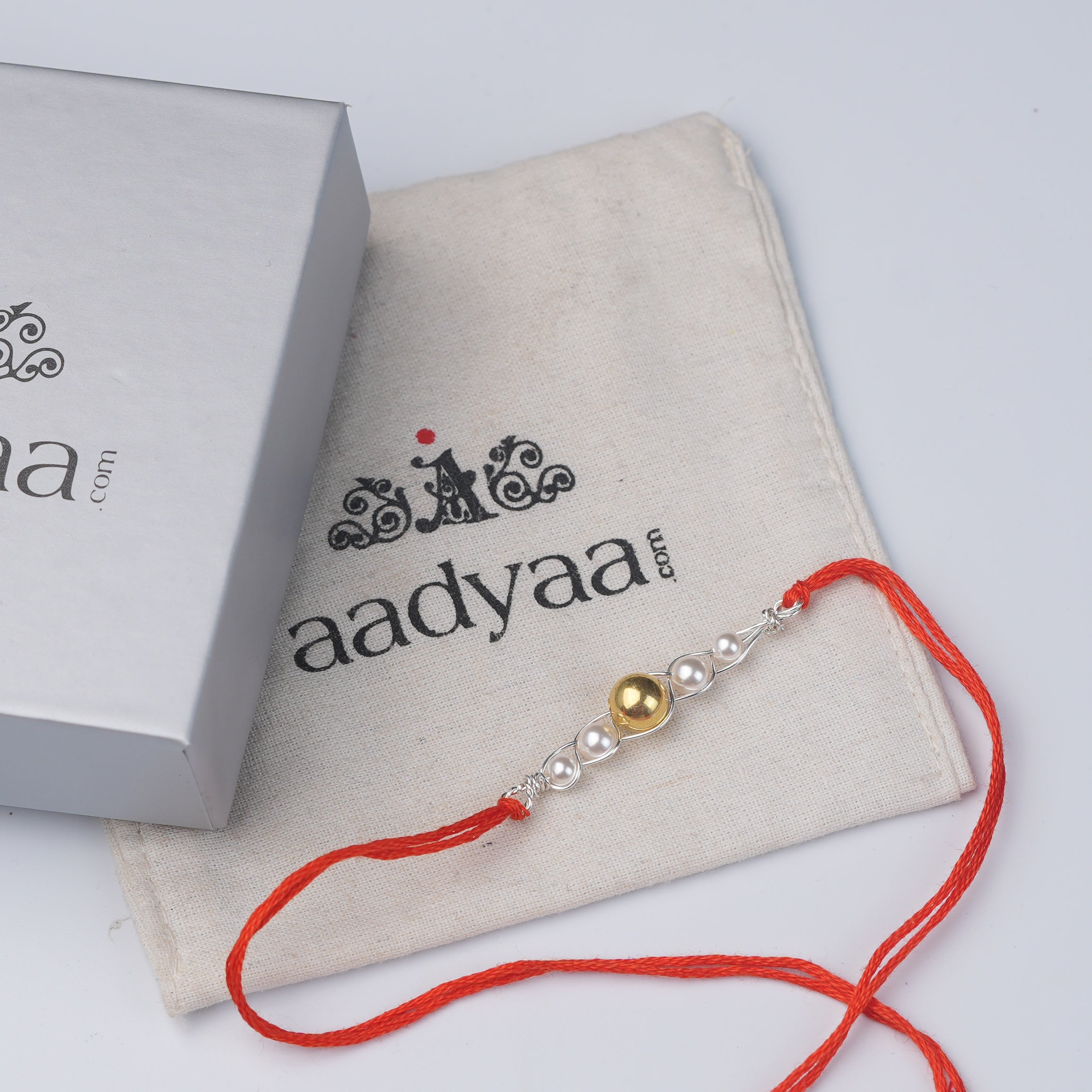 Gold-Plated Silver Bead & Pearl Wrapped Rakhi (Project Handmade)