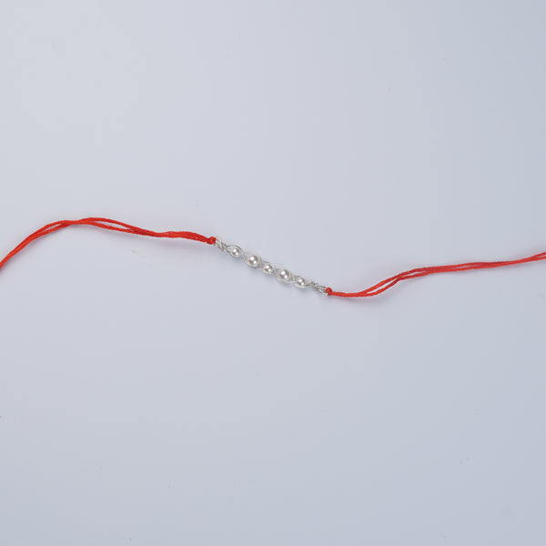 Pearl Wrapped Rakhi (Project Handmade)