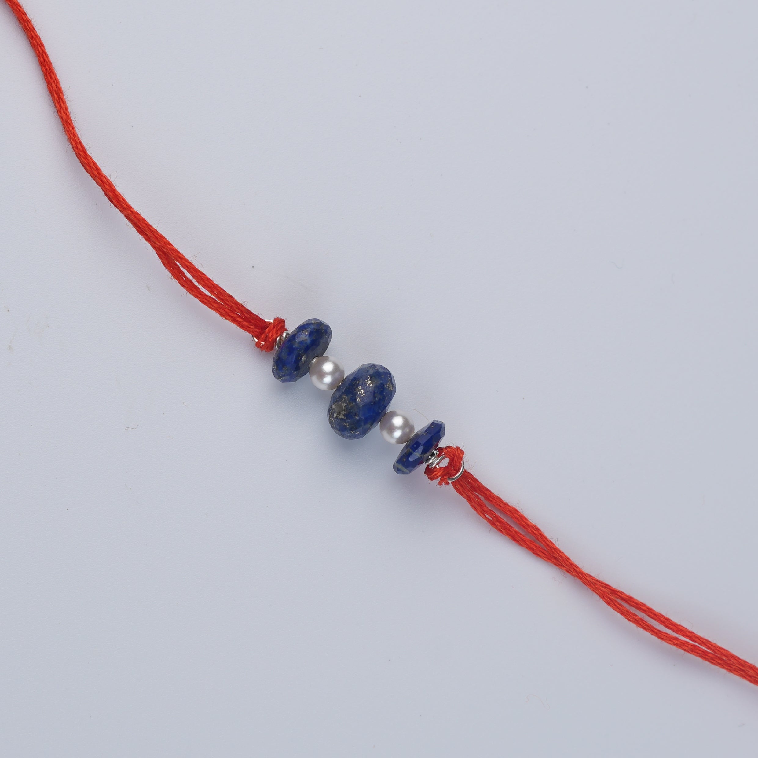 Flat Lapis Lazuli & Pearl Rakhi (Project Handmade)