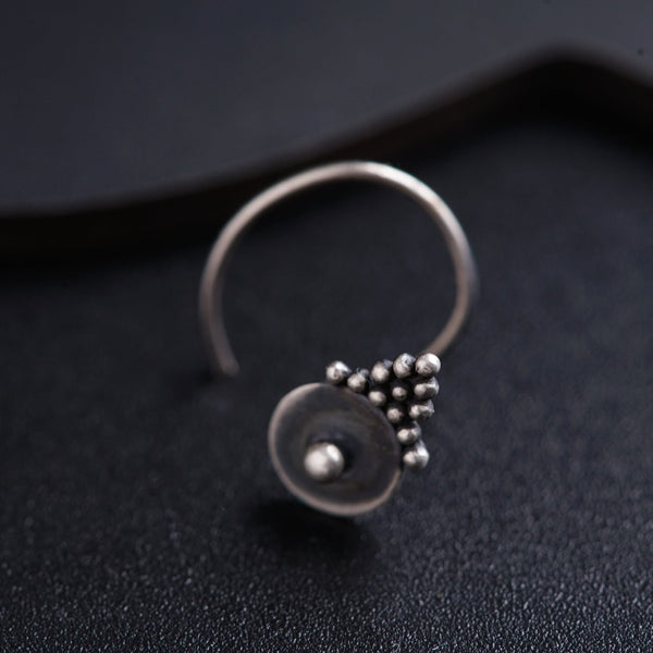 a close up of a ring on a table