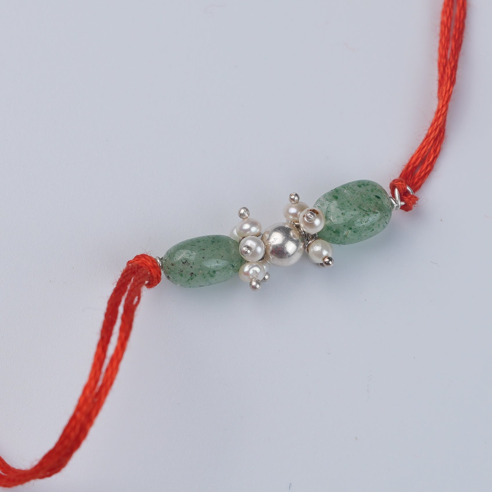Silver Bead, Russian Quartz & Pearl Bunch Rakhi (Project Handmade)