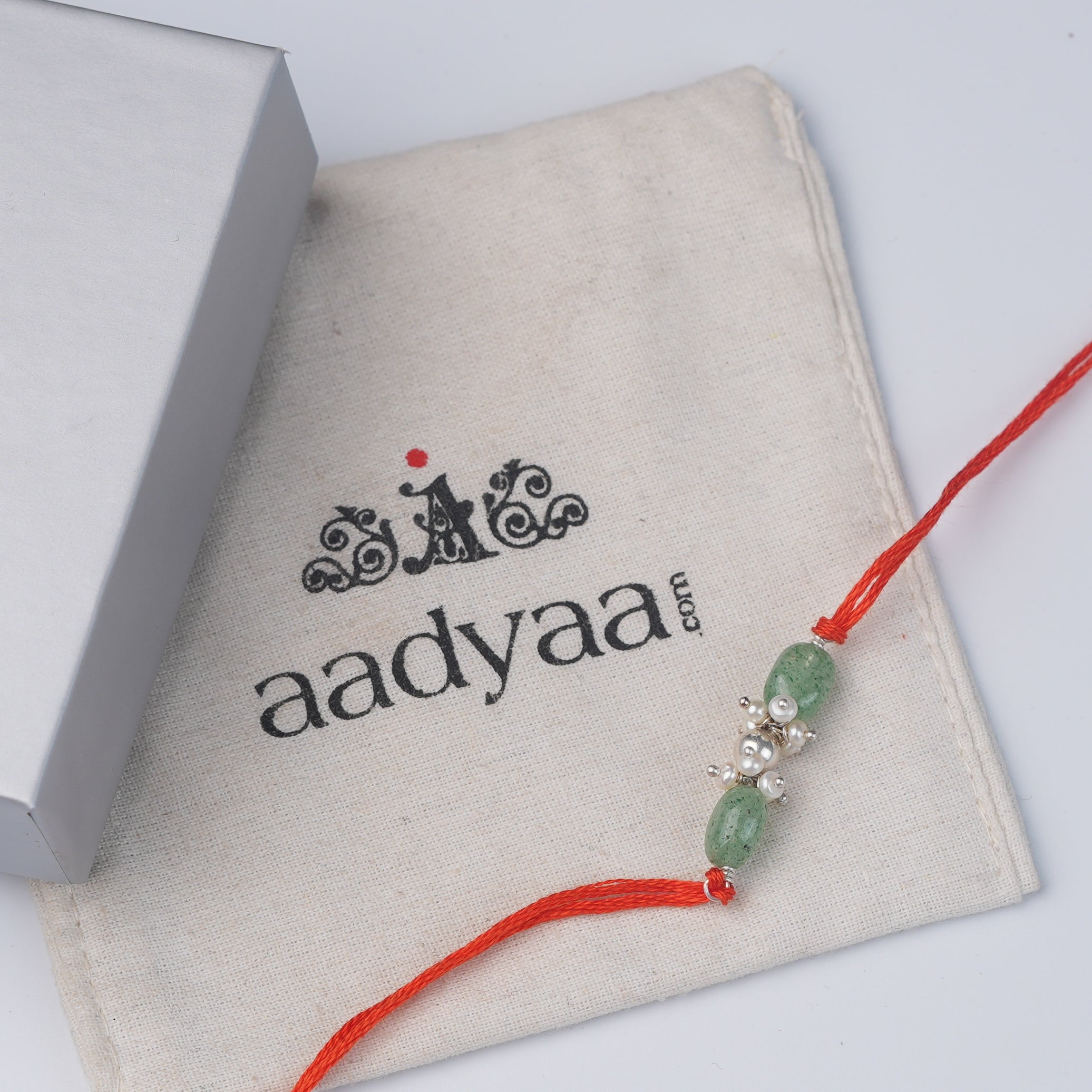 Silver Bead, Russian Quartz & Pearl Bunch Rakhi (Project Handmade)