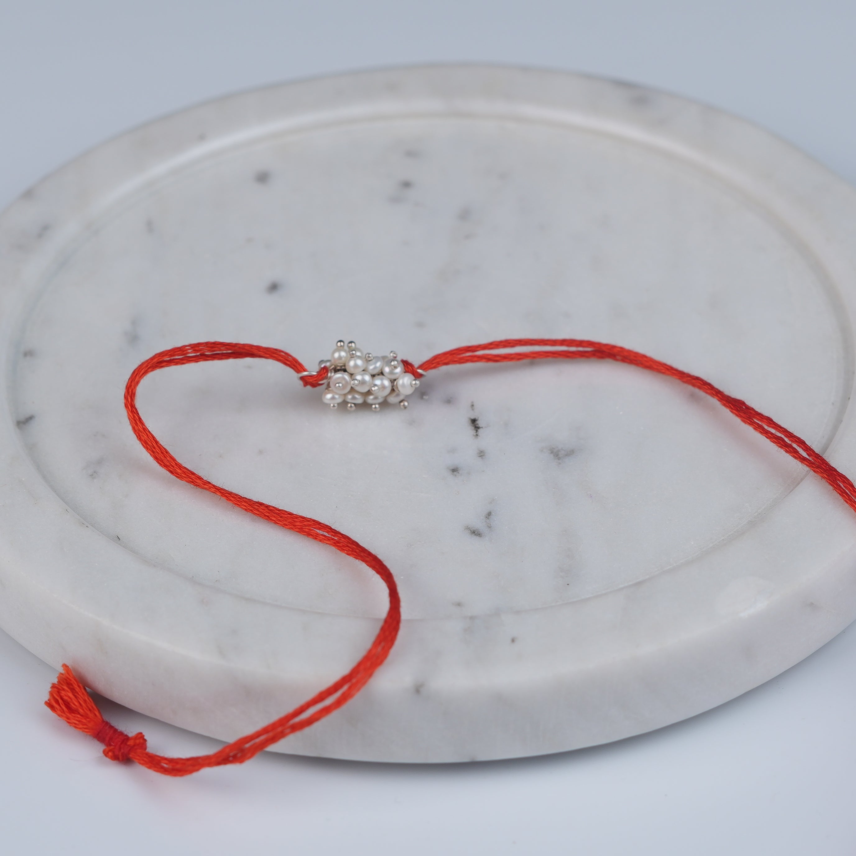 Pearl Bunch Rakhi (Project Handmade)