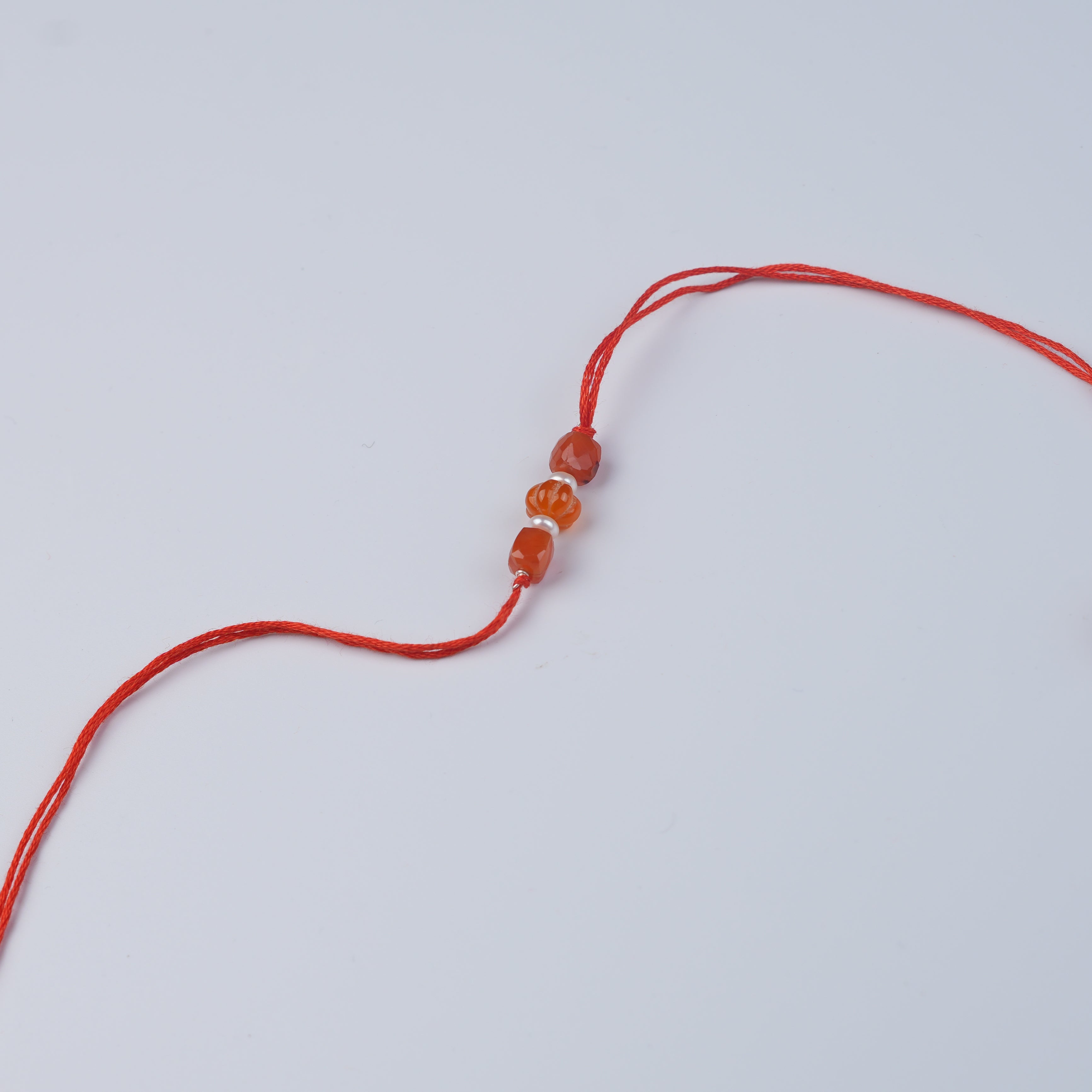 Carnelian & Freshwater Pearl Rakhi (Project Handmade)