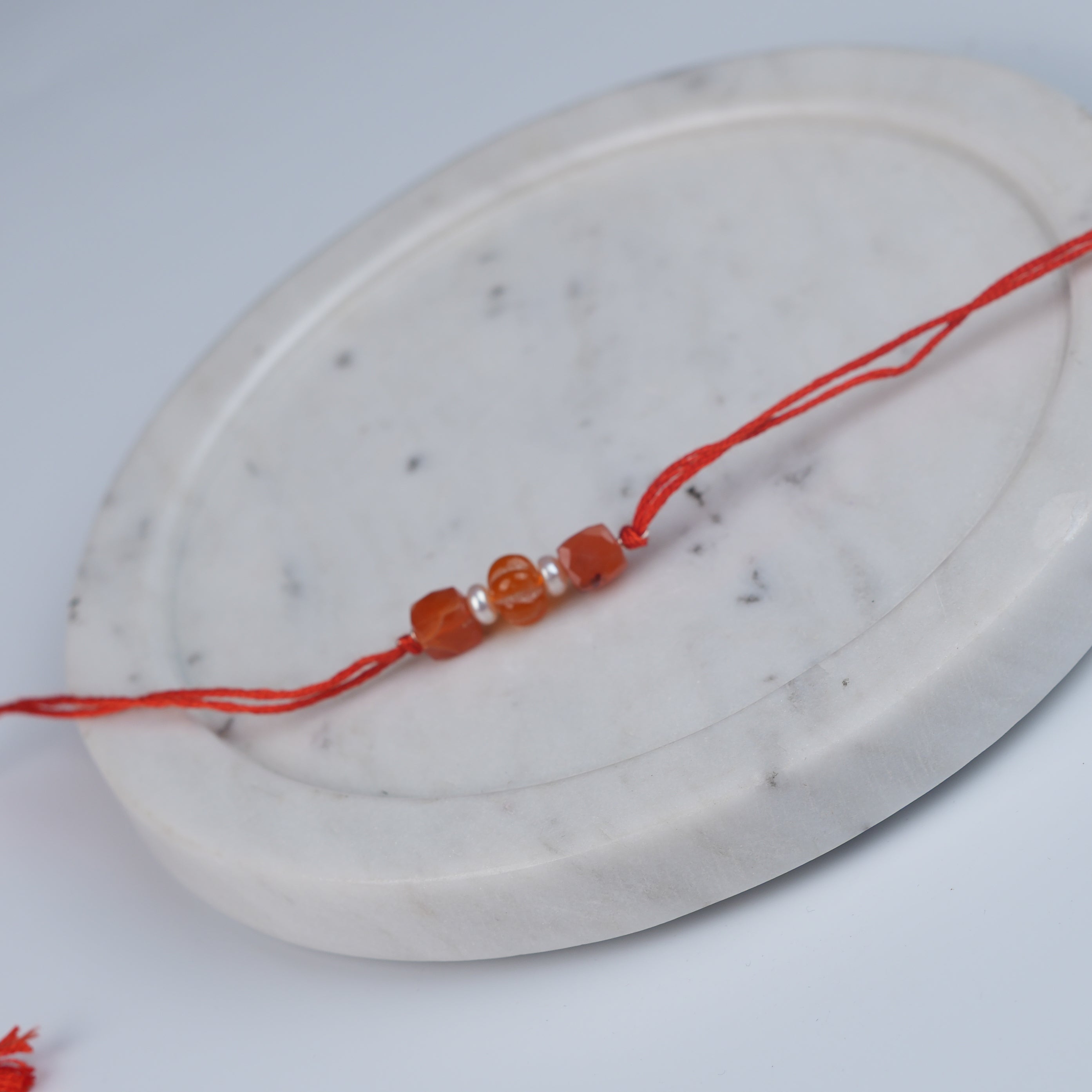 Carnelian & Freshwater Pearl Rakhi (Project Handmade)