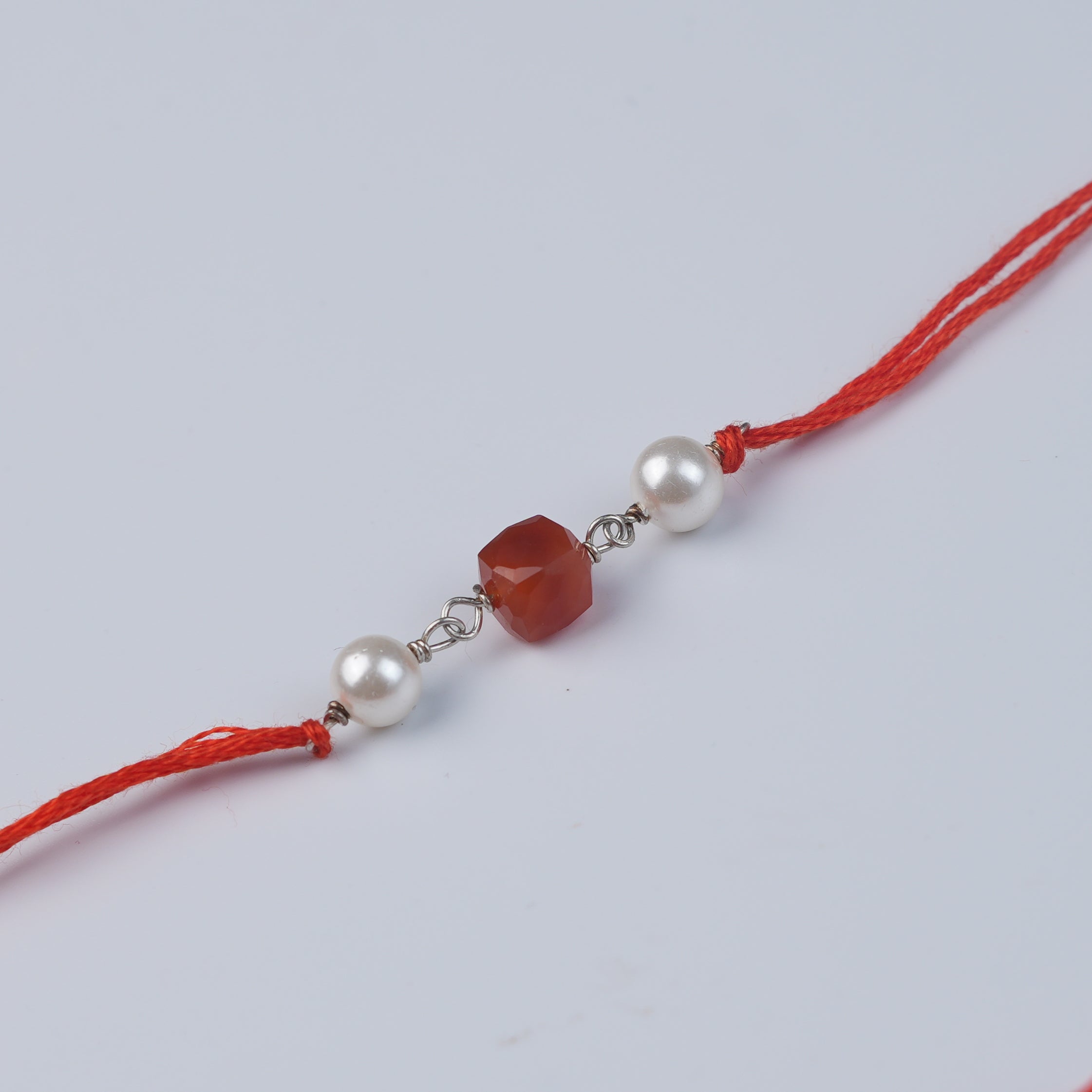 Carnelian & Pearl Rakhi (Project Handmade)
