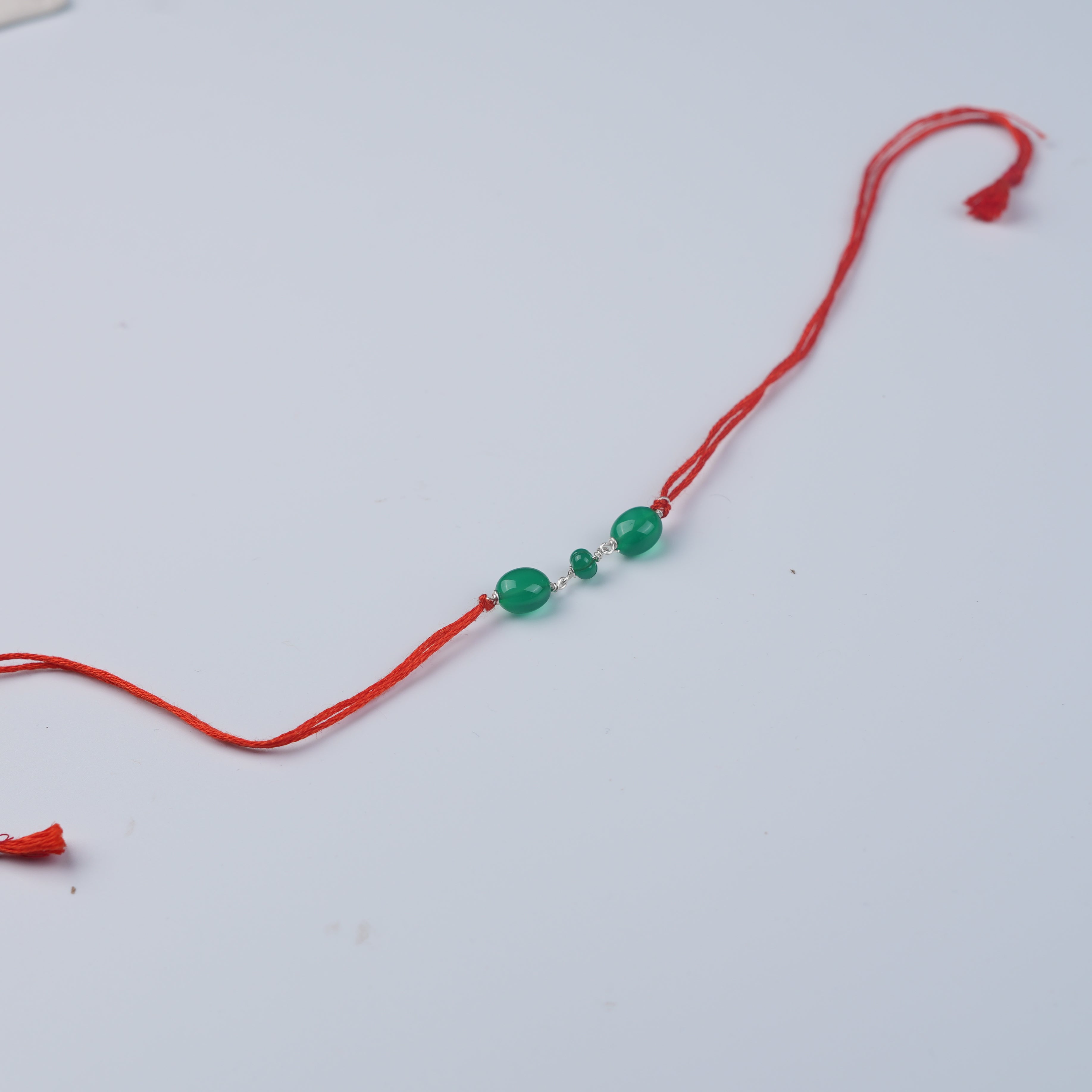 Green Onyx Ganthan Rakhi (Project Handmade)