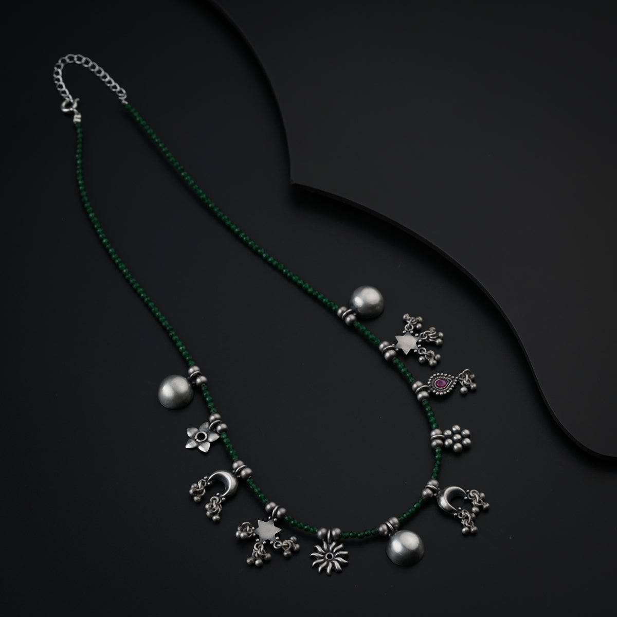 Silver Charms Motifs Necklace with Green Onyx Stone