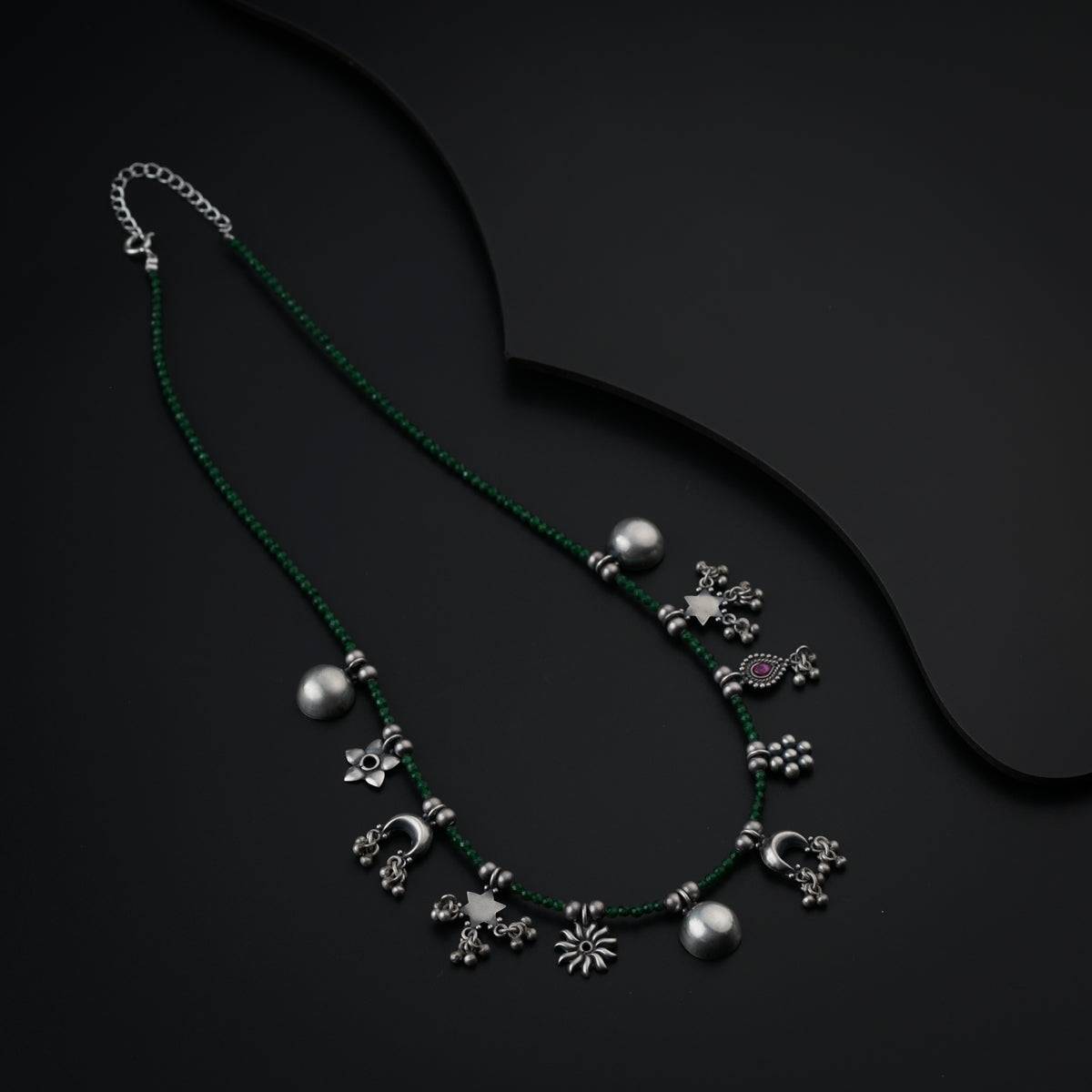 Silver Charms Motifs Necklace with Green Onyx Stone