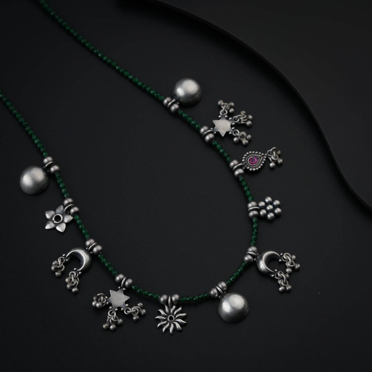 Silver Charms Motifs Necklace with Green Onyx Stone