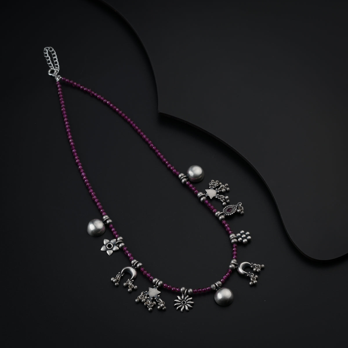 Silver Charms Motifs Necklace with Ruby