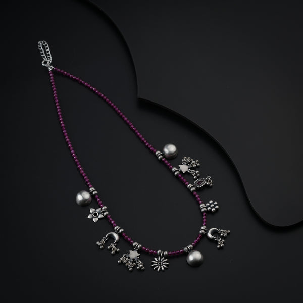 Silver Charms Motifs Necklace with Ruby