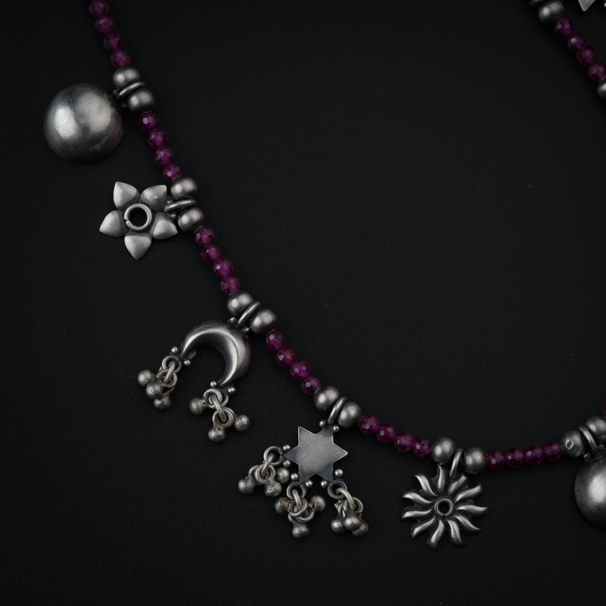 Silver Charms Motifs Necklace with Ruby