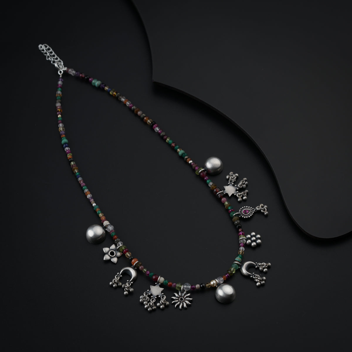 Silver Charms Motifs Necklace with Multicolor Semi Precious Stones