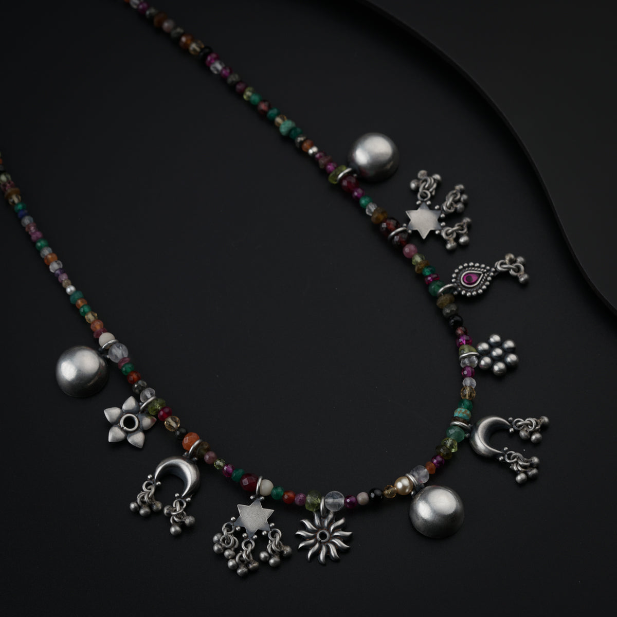 Silver Charms Motifs Necklace with Multicolor Semi Precious Stones