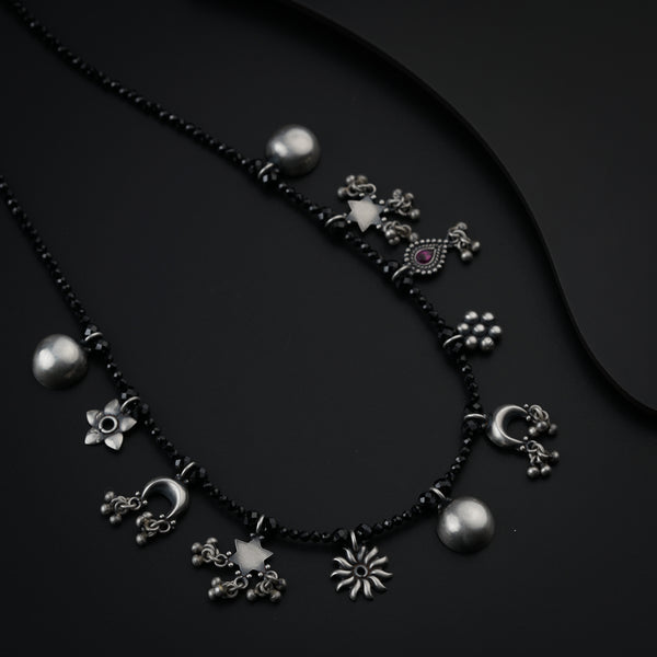Silver Charms Motifs Necklace with Black Spinel